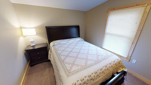 Bedroom 2 comfortably accommodates 2  guests in its Queen sized bed. 