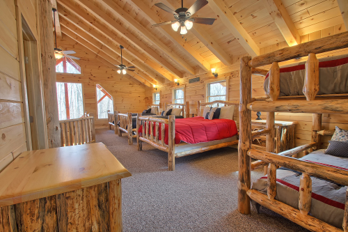 Long View of Open Loft, with non-private Bunk Set and 3 Queen Beds