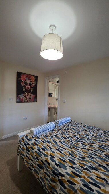 We love our wall art! You can also see the entrance to the ensuite too