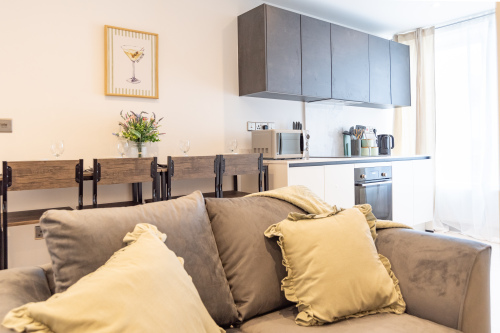 Bright open-plan living, dining and kitchen space designed for relaxing and socialising.