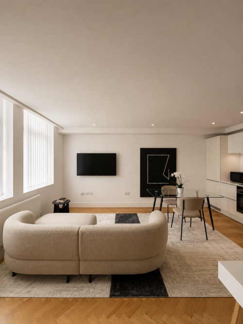 A beautifully designed and comfortable living area featuring a plush sofa and Netflix access — the perfect space to relax, unwind, and enjoy your favourite shows.