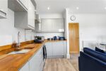 Stylish grey gloss kitchen