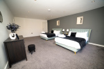 A thoughtfully furnished double bedroom, perfect for a comfortable and relaxing stay.