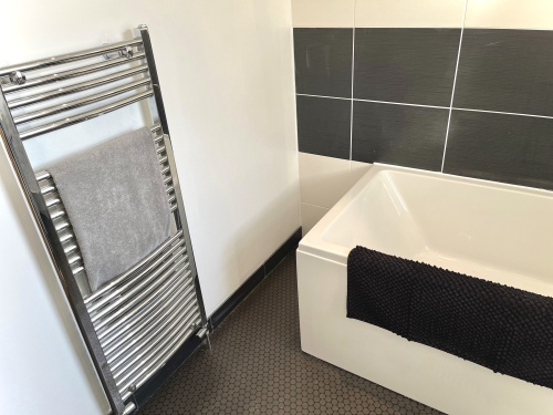 Bathroom - Modern bathroom with 3 piece suite and shower over the bath