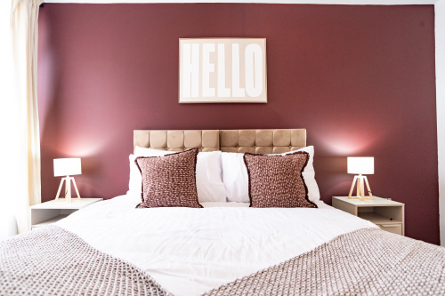 Stylish bedroom with zip-and-link king bed that can be arranged as twins.