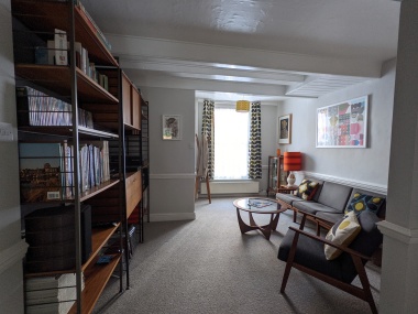 Homely lounge, with a selection of records to play on the record player!