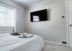 Bedroom 1: Double bed + Smart TV