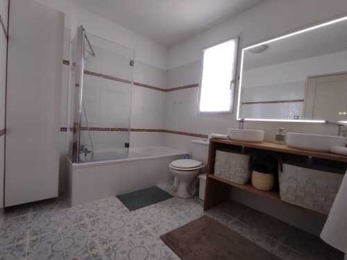 Salle de Bain double vasques et baignoire