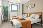 Two comfortable single beds perfect for a restful stay.