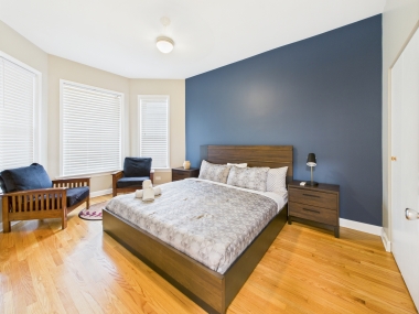 The King Suite — a symphony of navy, natural light, and refined comfort.