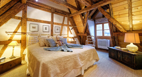Romantic bedroom under a beautiful old framework.
