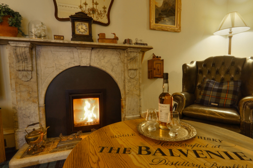 With log burning, comfortable seating ideal to enjoy a dram or watch TV