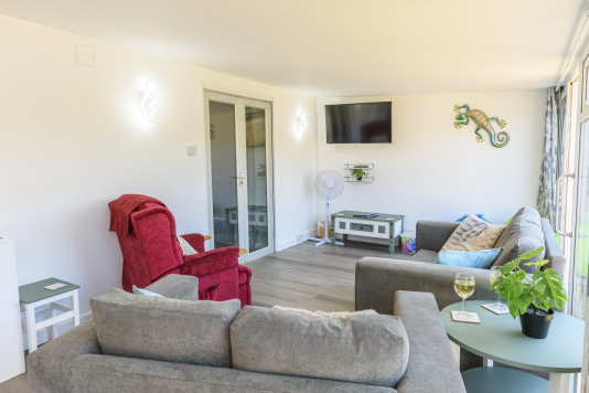 Spacious lounge with smart TV