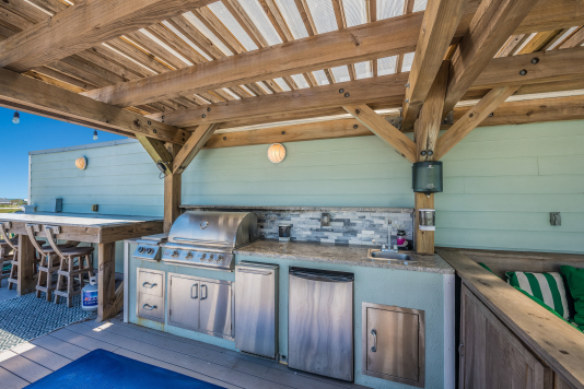 Roofto kitchen, grill area has lights including in-grill lighting