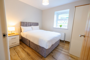 Bedroom with a king an single bed