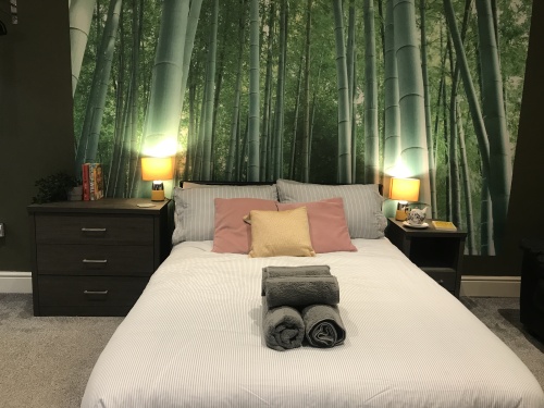 Comfy double be with fresh crisp linen sheets