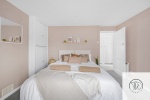 Bedroom is shown in King bed set up. The bed can be split into two singles. 