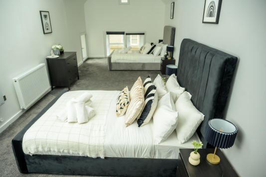 Comfortable two-single bedroom, perfect for friends or colleagues sharing.