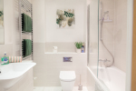 Master bathroom - Bath, Shower, Heated towel rail, and towels
