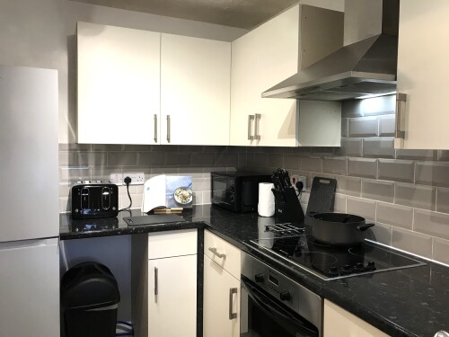 Tall Fridge Freezer - TLC Stay Preston area home