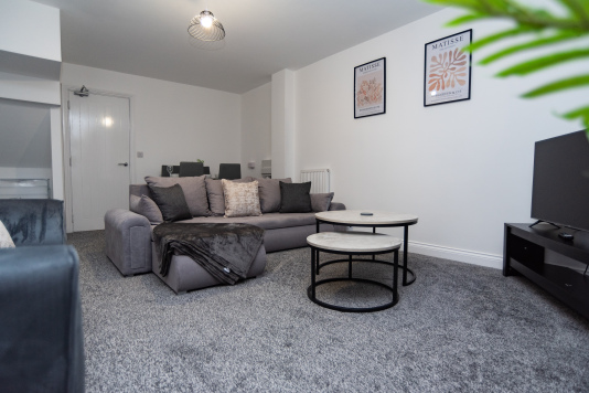 Lovely, spacious and spotless living room with a fully equipped setup and a comfortable sofa bed — ideal for relaxing or adding extra sleeping space.