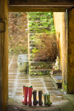 On rainy days, take a trudge through the garden in your wellies.