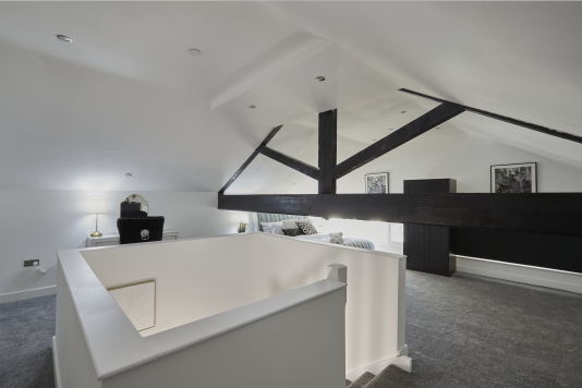 A warm and inviting double bedroom designed with your comfort in mind.