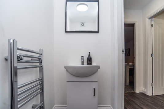 Spotlessly maintained WC with essential toiletries included.