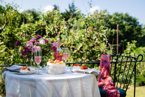 Enjoy breakfast on the terrace at Gardener Cottage