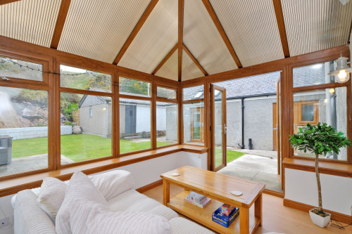 Conservatory leads to Garden as does Kitchen & Utility