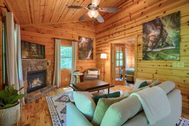 Modern cozy furniture with gas fireplace, smart TV and game table