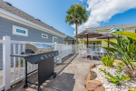 Propane grill available at pool in front of the home's patio