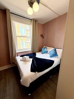 This photo represents the bedroom of the flat