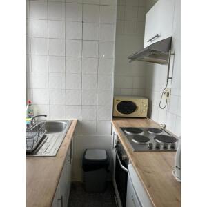 This photo represents the kitchen inside the flat. 