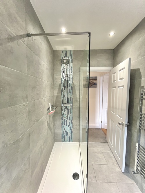 Bathroom - Unwind in style with this serene and refreshing bathroom oasis.