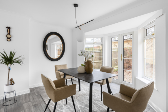 An elegant dining space designed for memorable meals and meaningful moments. With a sophisticated table setting, warm lighting and a seamless connection to the kitchen, it’s the perfect place to gather, share stories and enjoy food in style. Every meal here feels effortlessly refined.