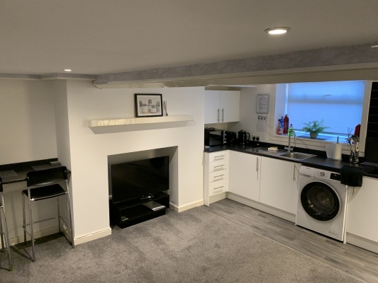 Living Room & Kitchen Area