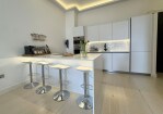 Very modern , stylish and fully equipped Kitchen with a breakfast counter 