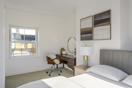 Sink into a luxurious double bed dressed in premium linens, framed by soft lighting and calming tones. This serene sanctuary offers a hotel-quality sleep experience and a peaceful escape from the day.