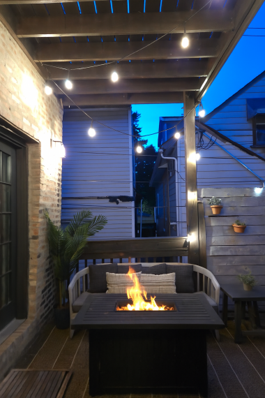 Soft lighting and cozy seating make this the perfect spot to unwind under the stars.
