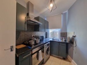 This photo represents the kitchen of the flat