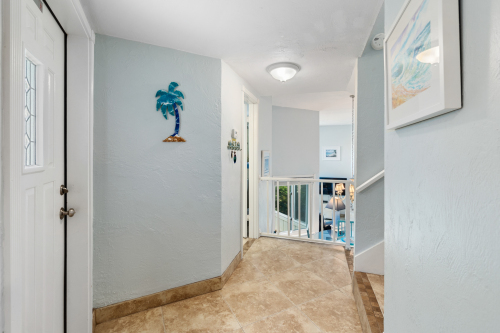 Front doorway looking into dining and living room area.