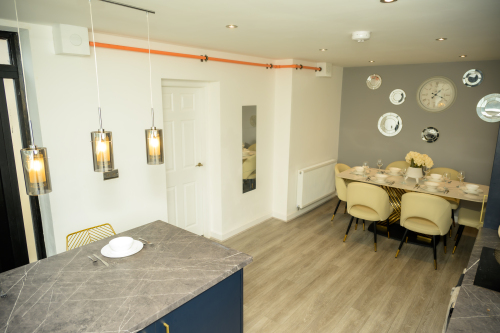 A comfortable dining space, perfect for family meals or casual dining.