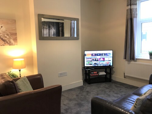 Living room - Relax and stream your favourite show on the Smart TV