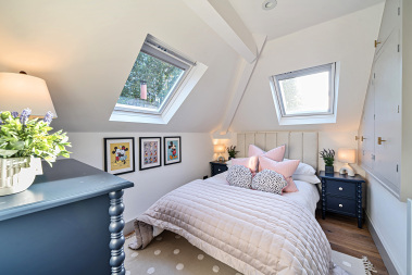 Luxury bedroom featuring a premium bed and sophisticated décor