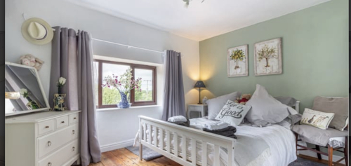 1st floor double  bedroom with view over garden