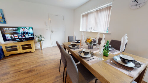 SRK Serviced Accommodation - Table and six chairs to all relax and dine together