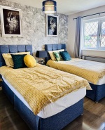 TWO SINGLE BEDS