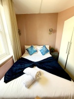 This photo represents the bedroom of the flat