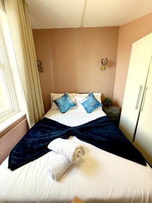 This photo represents the bedroom of the flat